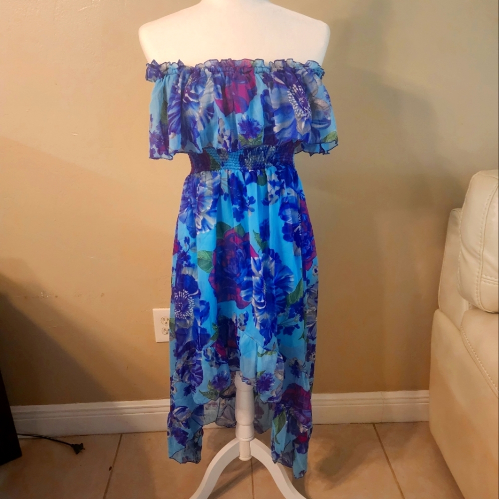 Strapless sundress longer in back shorter in front.